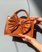 Branded brown women’s handbag
