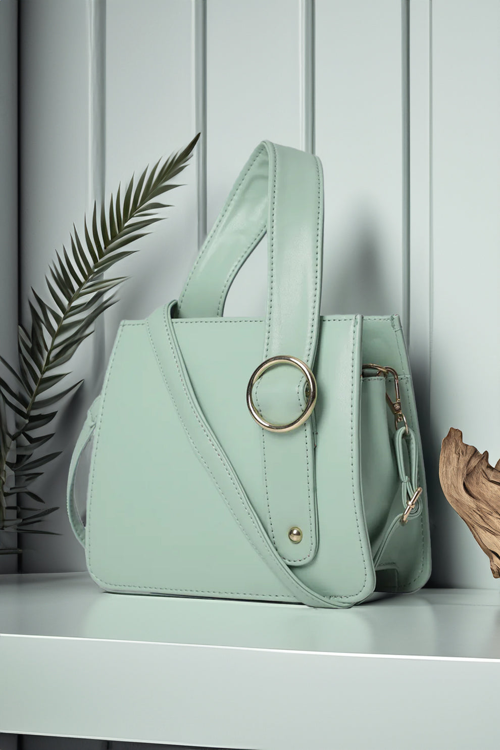 Trendy women’s handbag in Cyan